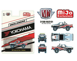 M2 Machines 1:64 1985 Toyota 4×4 Off-Road Pickup Yokohama Geolandar – White – MiJo Exclusives